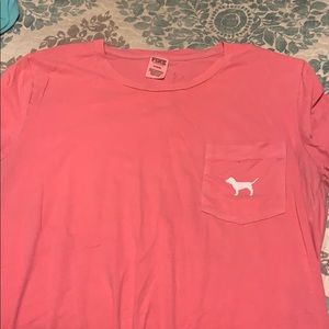 Pink shirt.